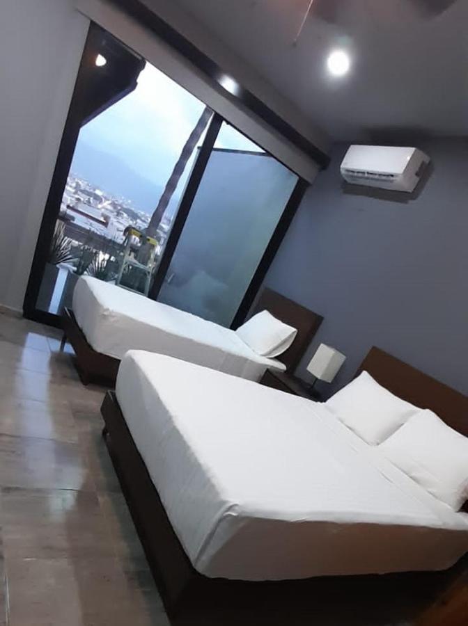 El Refugio Apartment เอนเซนาดา ภายนอก รูปภาพ